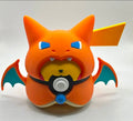 Pikachu figure wearing a Charizard poncho